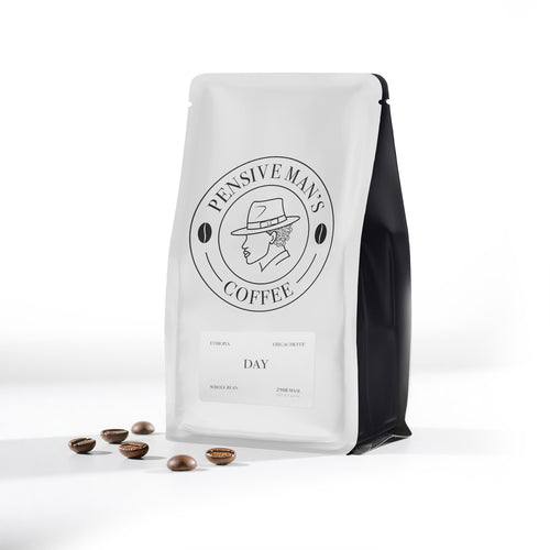 Coffee bag with 'Pensive Man's Coffee' branding on a white background